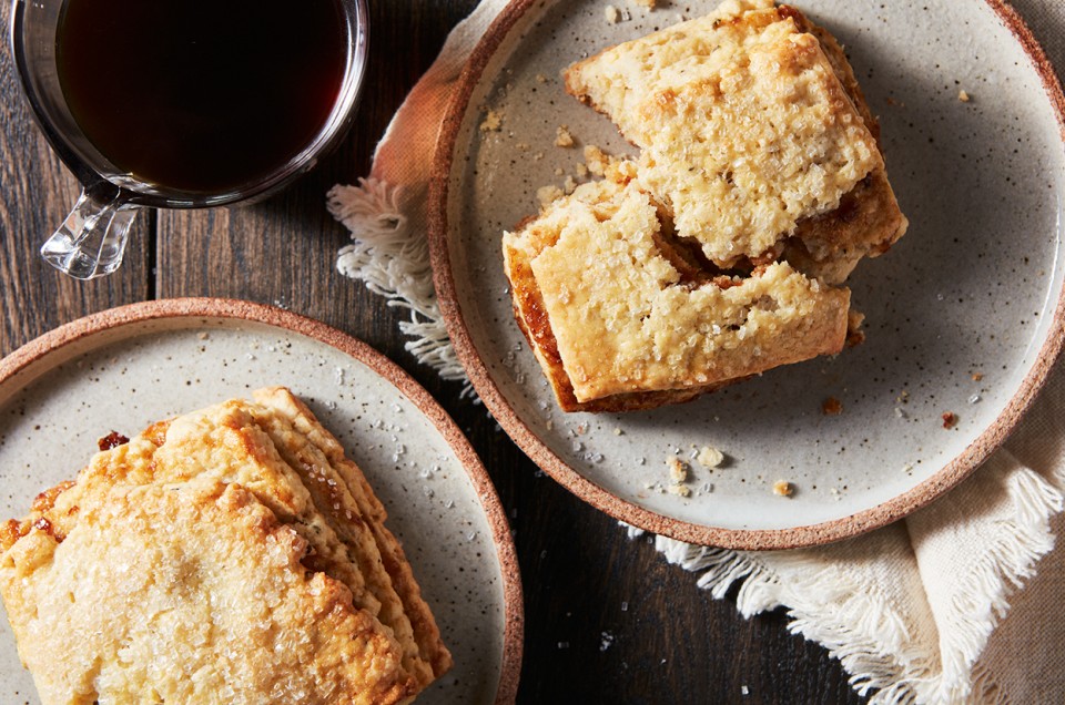 Several Layered Fig Scones on plates, ready to be eaten - select to zoom