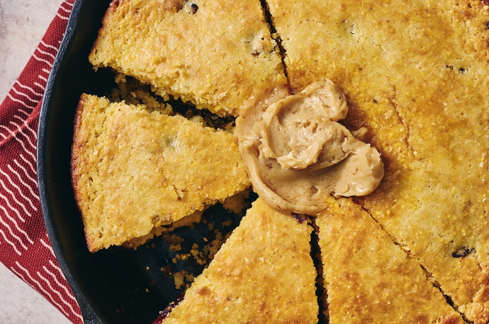 Cranberry Cornbread in a cast iron pan - select to zoom