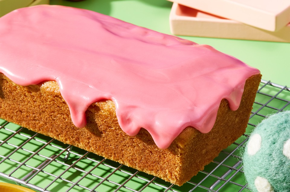 Pink Lemonade Cake on a cooling rack - select to zoom