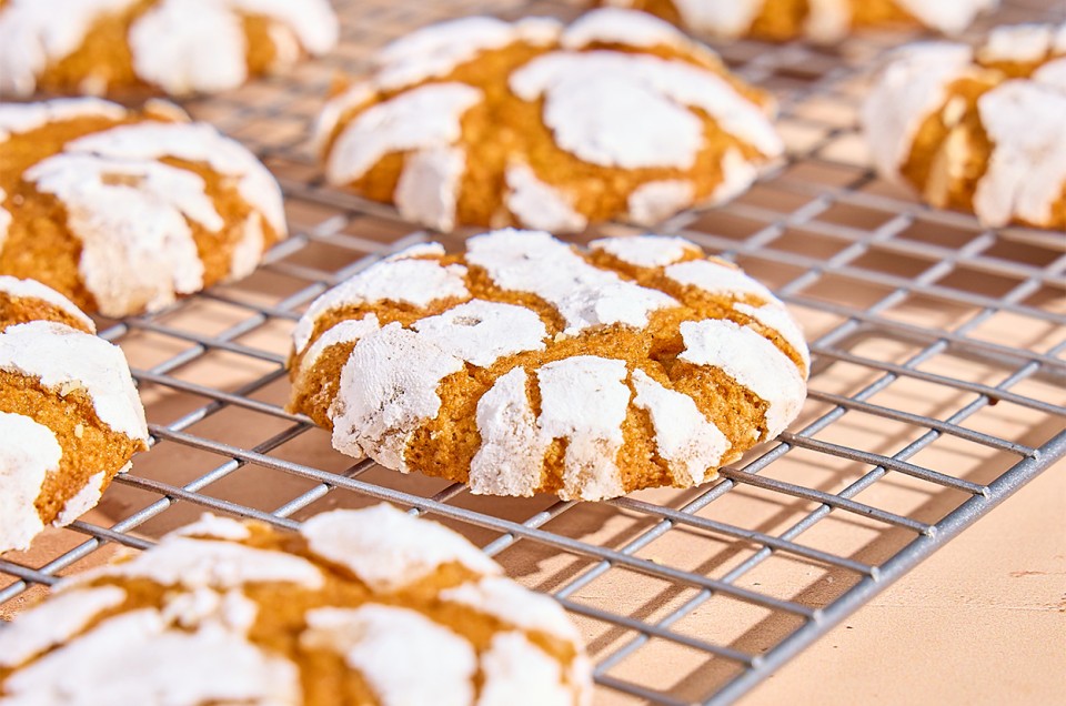Pumpkin Crinkle Cookies on a cooling rack - select to zoom