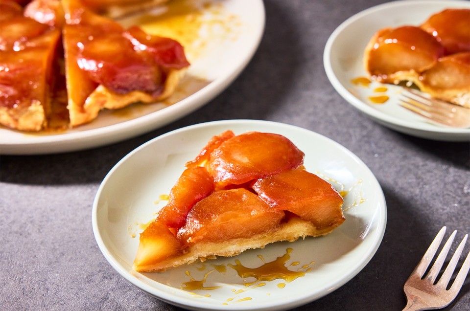 A slice of Classic Apple Tarte Tatin on a plate - select to zoom