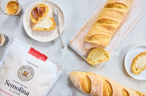 Semolina Baguettes; one has been sliced - select to zoom