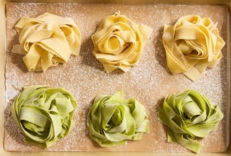 Sourdough Pasta nests on a sheet of parchment