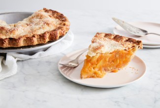Slice of peach pie