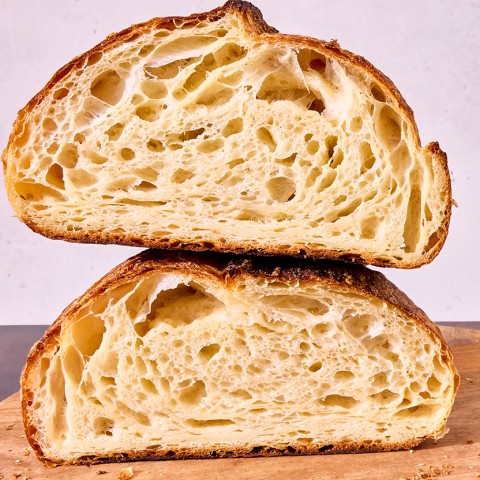 Croissant Sourdough Bread cut in half and stacked high