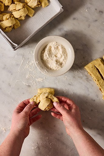 Knotted french onion roll dough.