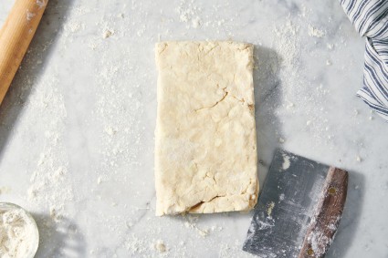 Pie dough that has been cut and stacked to make layers