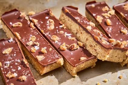 No-Bake Chocolate and Date Energy Bars on parchment paper